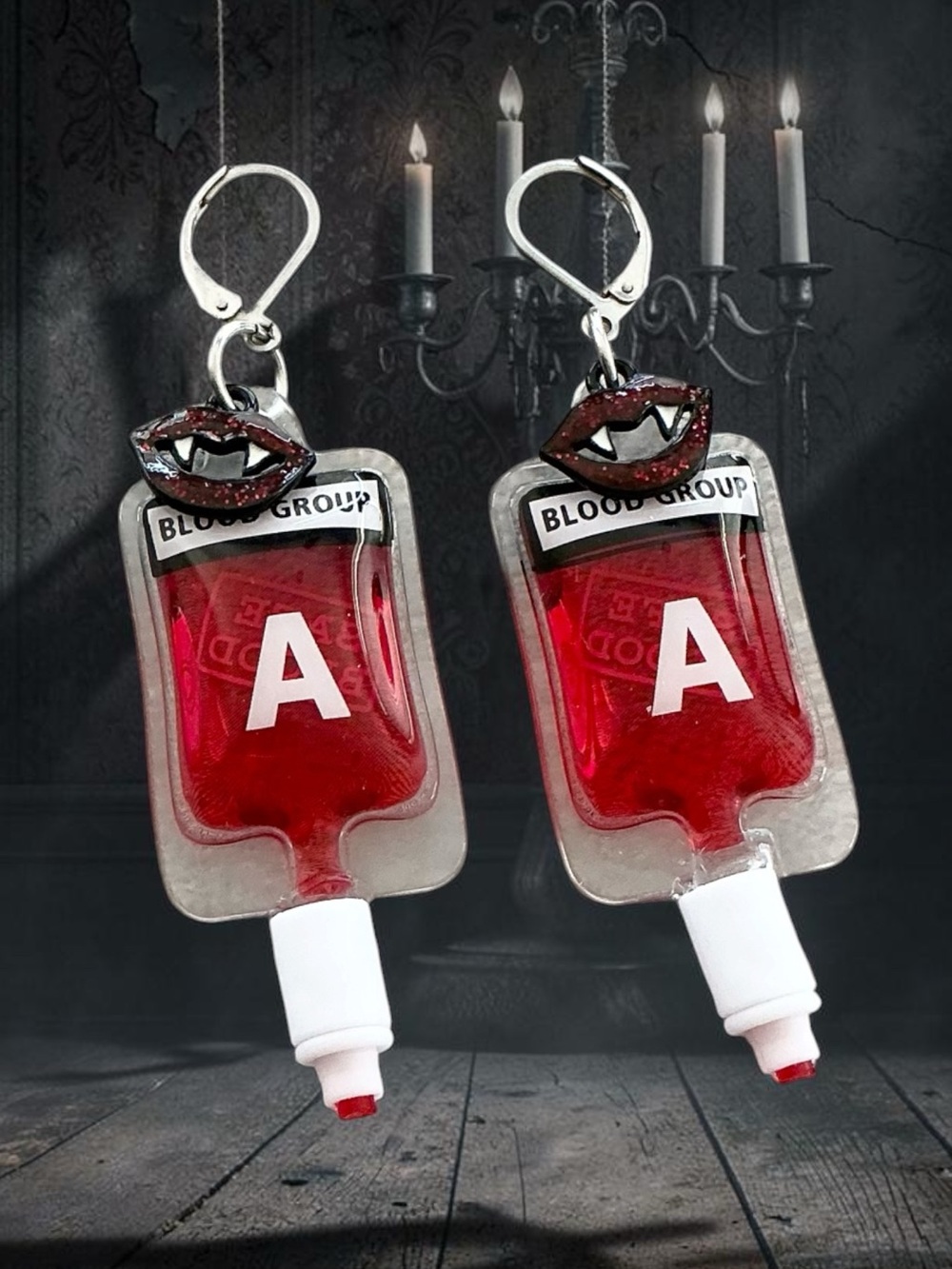 🆕 A Blood Bag with Vampire Teeth Dangle Earrings